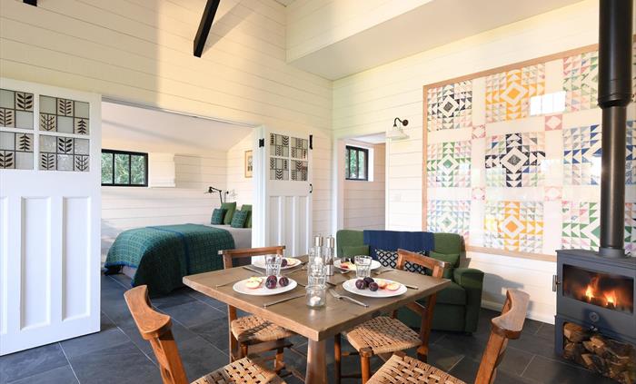 A journey of discovery that began in America has come full circle and found fruition on the Welsh Coastline. Walden Lodge is a hub of influences and